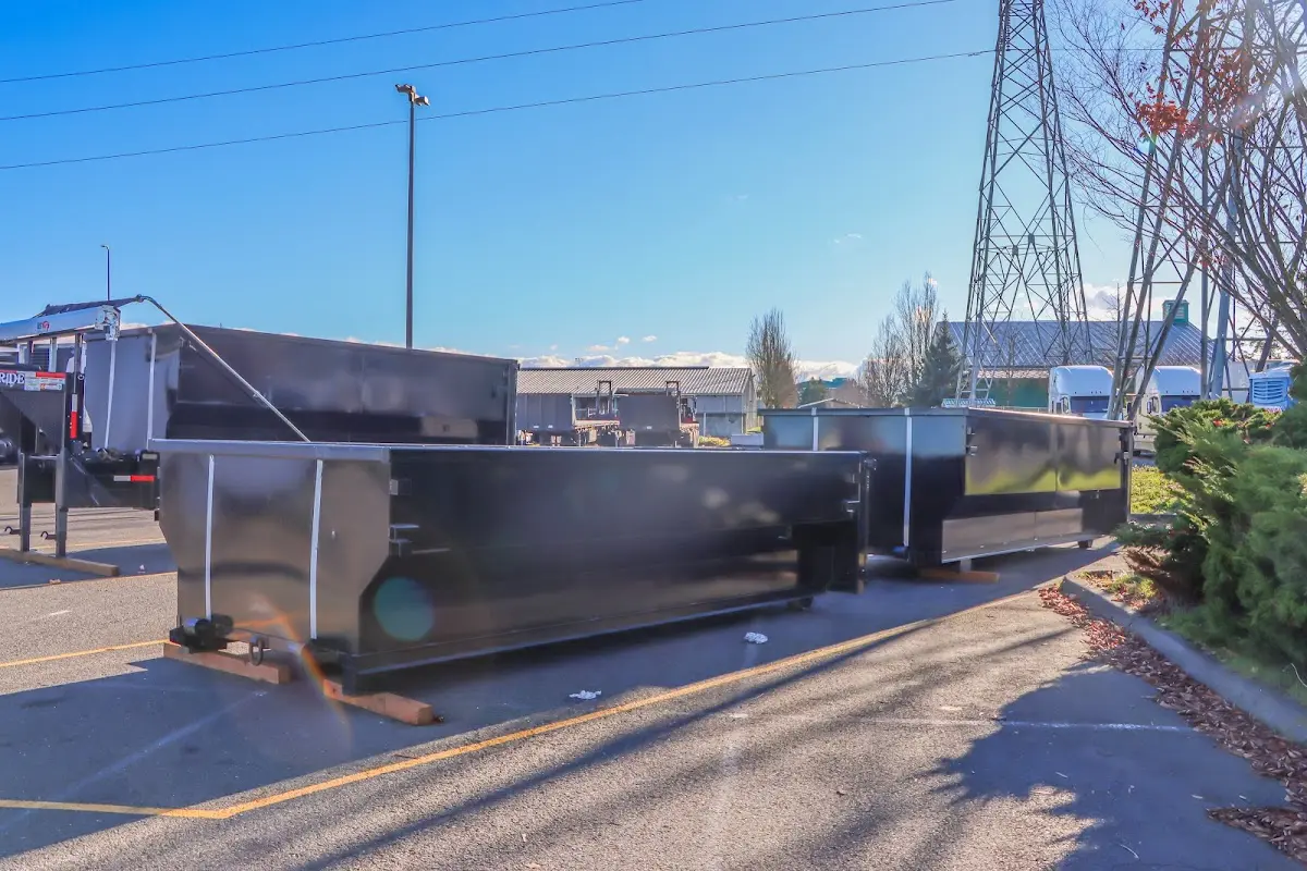 Roll-off dumpster ready for waste disposal at job site for Construction Dumpster Rental in Woodstock